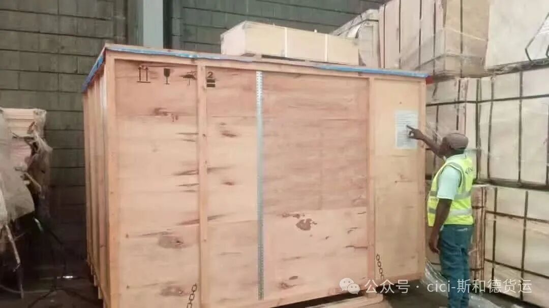 SPEED INT'L team inspecting project cargo and wooden crates during a transit delay